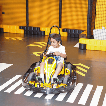 Child enjoying go-karting at Wooray Elite Ludhiana